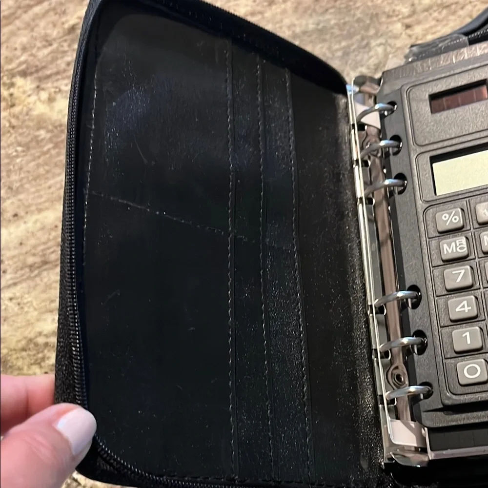Organizer/Planner/Wallet zippered with Calculator and compartments never used